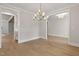 Elegant dining room featuring modern lighting and an open layout, perfect for entertaining at 3912 Cedar Knolls Dr, Youngsville, NC 27596