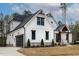 Charming modern farmhouse-style home with a two-car garage and well-maintained landscaping at 3912 Cedar Knolls Dr, Youngsville, NC 27596