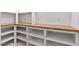 Walk-in pantry featuring custom shelving and wooden countertops for organized storage solutions at 3912 Cedar Knolls Dr, Youngsville, NC 27596