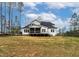 A spacious screened porch and deck highlight this home's outdoor living space at 3912 Cedar Knolls Dr, Youngsville, NC 27596