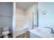 Clean bathroom with a bathtub, toilet, and vanity at 46 Streamline Ct, Lillington, NC 27546