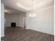Formal dining room with hardwood floors and chandelier at 46 Streamline Ct, Lillington, NC 27546
