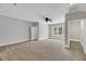Expansive bedroom featuring plush carpeting and a ceiling fan at 7320 Dunsany Ct, Wake Forest, NC 27587
