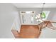 Elegant foyer with hardwood floors, staircase and chandelier at 7320 Dunsany Ct, Wake Forest, NC 27587