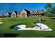 Picturesque golf course and clubhouse on a bright sunny day, perfect for golf enthusiasts at 7320 Dunsany Ct, Wake Forest, NC 27587