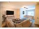 Spacious living room showcasing a comfortable sofa and entertainment area at 7320 Dunsany Ct, Wake Forest, NC 27587