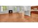 Spacious living area showcasing hardwood floors, a fireplace, and seamless flow to the outdoor patio space at 7320 Dunsany Ct, Wake Forest, NC 27587