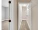 Neutral-toned walk-in closet with wire shelving and plush carpeting at 7320 Dunsany Ct, Wake Forest, NC 27587