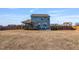 Large backyard with a deck, patio, privacy fence, and ample green space for outdoor enjoyment at 8217 Cannon Grove Dr, Willow Springs, NC 27592