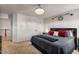 Bedroom with a queen bed, a nightstand, and a chandelier at 8217 Cannon Grove Dr, Willow Springs, NC 27592