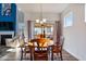 Bright dining room with wooden table and access to a screened porch at 8217 Cannon Grove Dr, Willow Springs, NC 27592