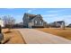 Stylish home with an attached garage and a well-kept yard, offering a blend of comfort and curb appeal at 8217 Cannon Grove Dr, Willow Springs, NC 27592