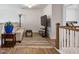 Living room with a sofa, rug, TV, and table at 8217 Cannon Grove Dr, Willow Springs, NC 27592