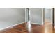 Hardwood floor bedroom with access to bathroom and another bedroom at 101 Stefi Ct, Garner, NC 27529