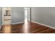 Hardwood floor bedroom with access to the bathroom at 101 Stefi Ct, Garner, NC 27529