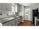 Kitchen features stainless steel appliances and gray countertops at 101 Stefi Ct, Garner, NC 27529