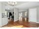 Open concept kitchen and dining area with hardwood floors and stainless steel appliances at 101 Stefi Ct, Garner, NC 27529