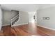 Spacious living area with hardwood floors, neutral walls, and ample natural light at 101 Stefi Ct, Garner, NC 27529