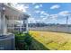 Spacious backyard with grassy area and screened porch at 1139 Atterlee Ln, Graham, NC 27253
