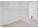 Walk-in closet with shelving units and ample storage space at 200 Regency Ridge Dr, Holly Springs, NC 27540