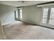 Main bedroom with double doors leading to a balcony at 250 S Estes Dr # Apt 94, Chapel Hill, NC 27514