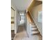 Hallway with carpeted floors and staircase leading upstairs at 250 S Estes Dr # Apt 94, Chapel Hill, NC 27514