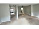 View of living room and hallway with carpeted floors at 250 S Estes Dr # Apt 94, Chapel Hill, NC 27514