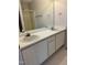 Bathroom with double vanity and a large mirror at 288 Rosa Cir, Willow Springs, NC 27592