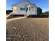 Ranch style home with front porch and landscaped yard at 288 Rosa Cir, Willow Springs, NC 27592