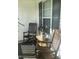 Cozy front porch with rocking chairs and small table at 288 Rosa Cir, Willow Springs, NC 27592
