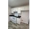 White cabinets and appliances in this clean and spacious kitchen at 288 Rosa Cir, Willow Springs, NC 27592