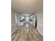 Open concept kitchen with white cabinets and tile flooring at 288 Rosa Cir, Willow Springs, NC 27592