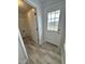 Convenient laundry room with built-in shelving and exterior access at 288 Rosa Cir, Willow Springs, NC 27592