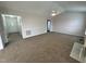 Large living room with vaulted ceilings and neutral decor at 288 Rosa Cir, Willow Springs, NC 27592