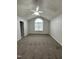 Main bedroom with vaulted ceiling and arched window at 288 Rosa Cir, Willow Springs, NC 27592