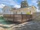 Elevated back deck with wooden railing at 317 Compton Rd, Raleigh, NC 27609