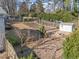 Large backyard with garden, shed, and fire pit at 317 Compton Rd, Raleigh, NC 27609