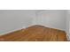 Bedroom with hardwood floors and double door closet at 317 Compton Rd, Raleigh, NC 27609