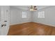 Bedroom with hardwood floors and ceiling fan at 317 Compton Rd, Raleigh, NC 27609