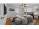 Well-decorated bedroom features wood floors, a large bed, and a calming color palette at 317 Compton Rd, Raleigh, NC 27609