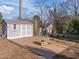 Deck with fire pit and shed in backyard at 317 Compton Rd, Raleigh, NC 27609