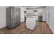 Modern kitchen with white cabinets and granite countertops at 317 Compton Rd, Raleigh, NC 27609