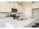 Modern kitchen with stainless steel appliances and island at 422 Suhani Ln, Clayton, NC 27520