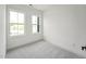 Neutral bedroom featuring carpet and two windows that allow ample natural light at 524 Billingshurst Way, Knightdale, NC 27545