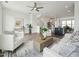 Open-concept living area with modern furnishings, hardwood floors, and ample natural light at 524 Billingshurst Way, Knightdale, NC 27545