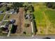 House on large lot near fields and other houses at 555 House Rd, Kenly, NC 27542