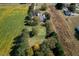 Home nestled on a large lot with farm fields nearby at 555 House Rd, Kenly, NC 27542