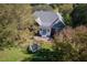 Brick house with patio, trampoline, and large backyard at 555 House Rd, Kenly, NC 27542