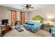 Bedroom with a green headboard and a treadmill at 555 House Rd, Kenly, NC 27542