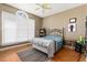 Bedroom with metal bed frame and wood floors at 555 House Rd, Kenly, NC 27542